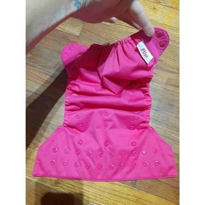 Cloth diapers cover by FLIP in pink.